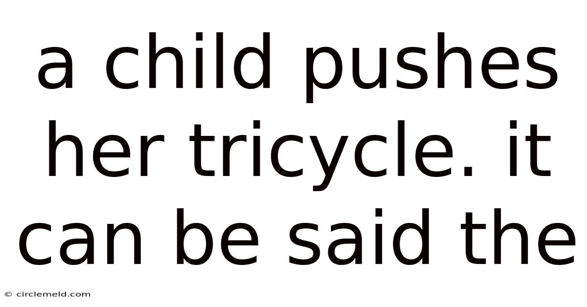 A Child Pushes Her Tricycle. It Can Be Said The